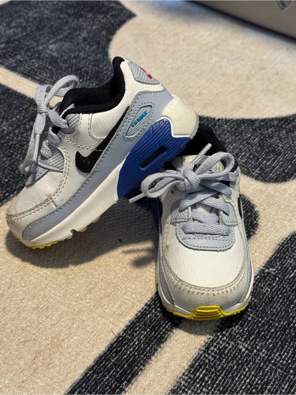 Nike Toddler White, Blue & Black Lightweight Sneakers with Yellow Accent